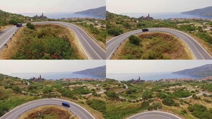 空中货车在通往Komiza村的道路上行驶