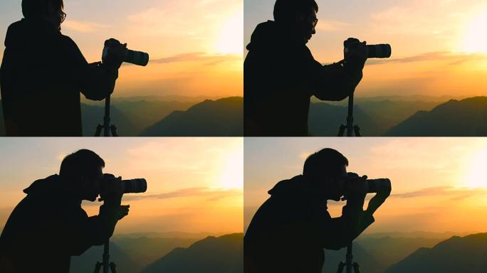 男子在山上旅行和摄影照片