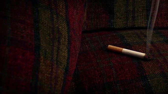 香烟燃烧沙发-火灾隐患概念