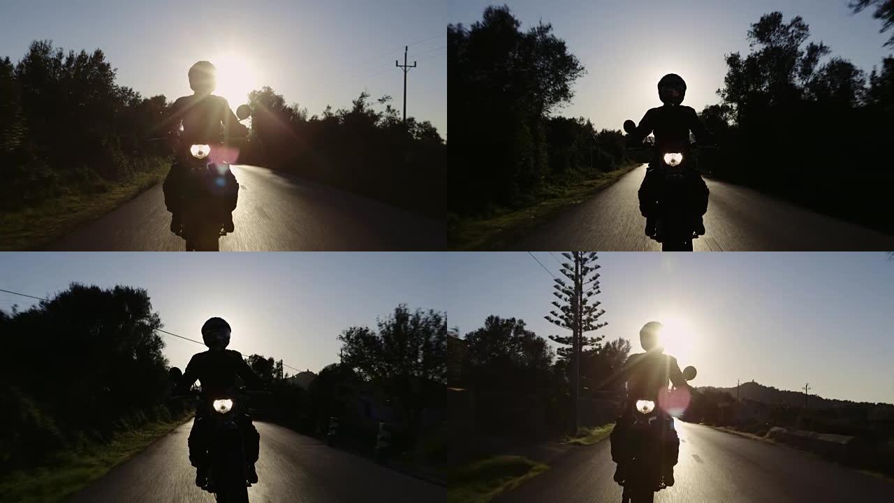 骑摩托车旅行的年轻女子。热带气候