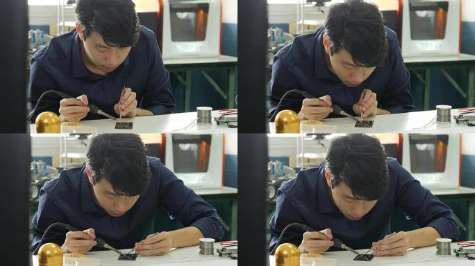 亚洲电子工程师正在他的车间焊接电板。亚洲学生正在教室里学习电子和焊接。