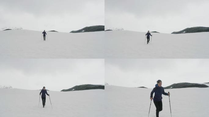 女人用登山杖徒步旅行