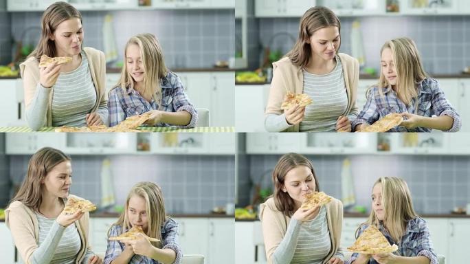 母女吃披萨实拍视频素材