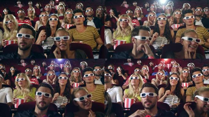 人们3D观看电影3D眼镜3D电影惊吓