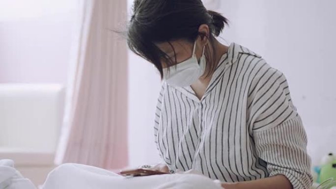 患流感的女人卧床病房病床治疗养病