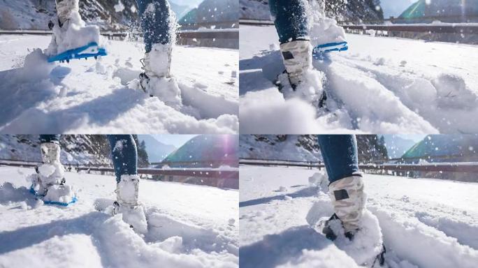 冬季景观中的雪鞋行走