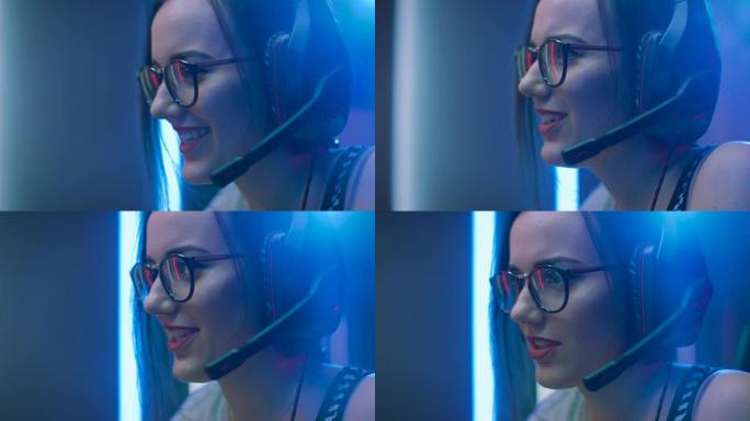 在线视频游戏中扮演的美丽职业玩家女孩的特写肖像，戴着眼镜的休闲可爱怪胎，通过耳机与队友/朋友交谈/聊