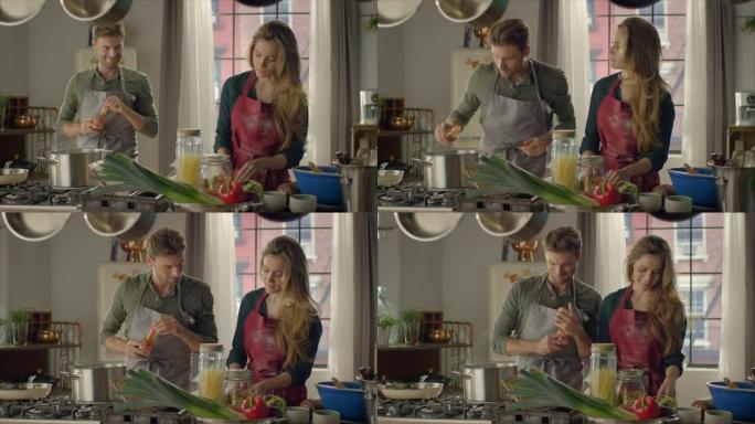 情侣在厨房一起做饭