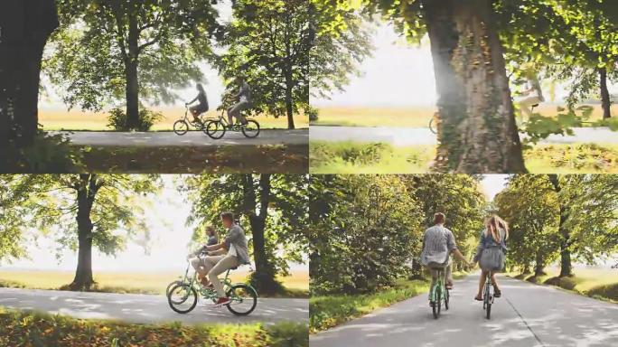 一对情侣沿着绿树成荫的道路骑自行车