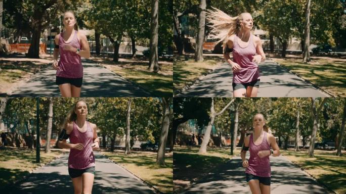 女子在公园慢跑体育锻炼身心修养陶冶情操