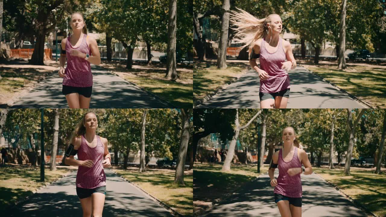 女子在公园慢跑体育锻炼身心修养陶冶情操