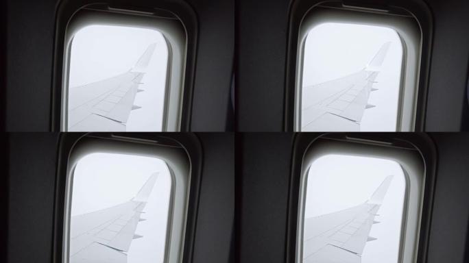 在经历一些湍流时从飞机窗口观看