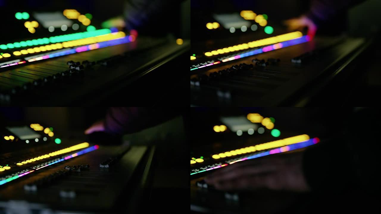 DS DJ在夜总会使用混音控制台