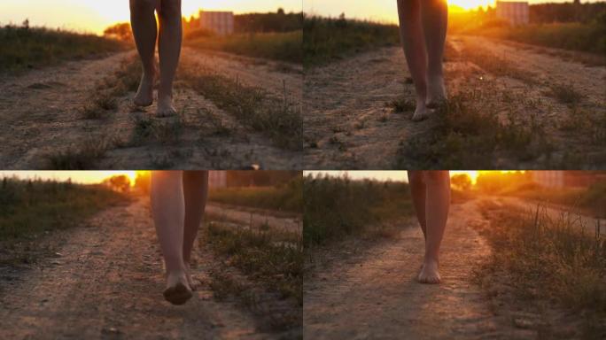 女人赤脚走在土路上