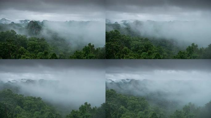 山的时间流逝和移动的薄雾多云的雨林，自然镜头背景