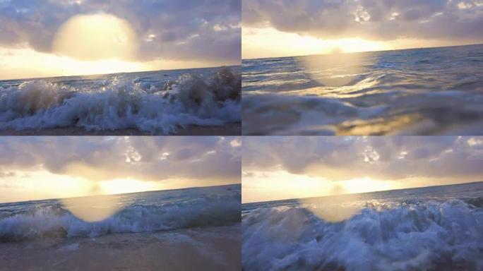 日落时分，海浪来到沙滩上