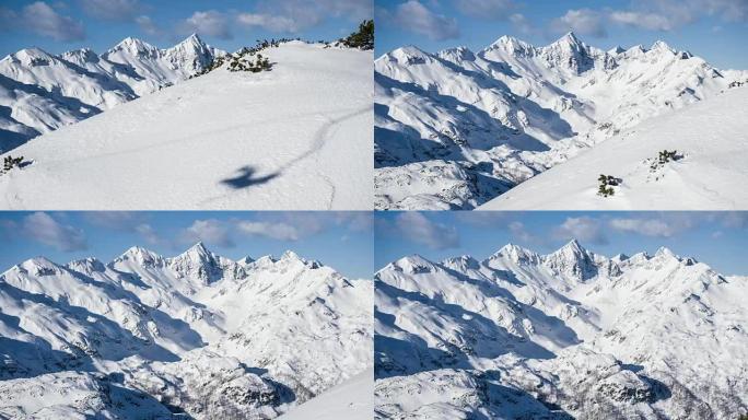 从滑雪胜地的升降椅上看到积雪覆盖的山脉