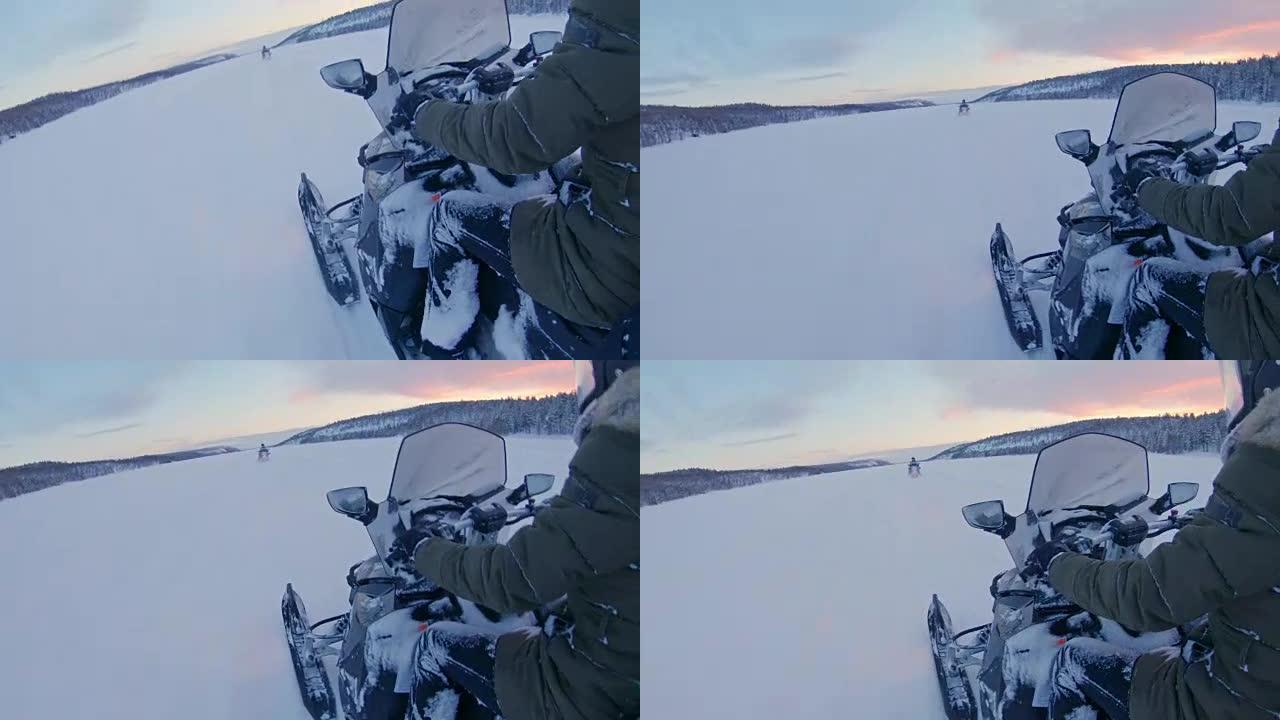 POV骑着雪地摩托穿过雪地