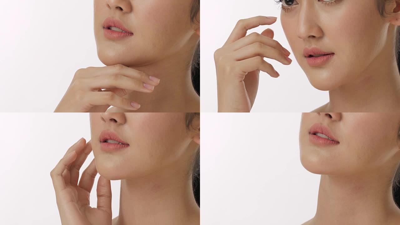 近距离肖像美丽的年轻亚洲女人触摸脸和健康的皮肤在慢动作护肤概念