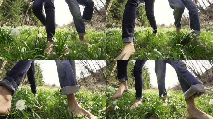 高清超慢动作: 情侣赤脚走过草地
