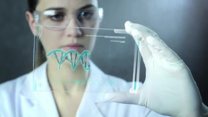 女科学家正在分析结构DNA。