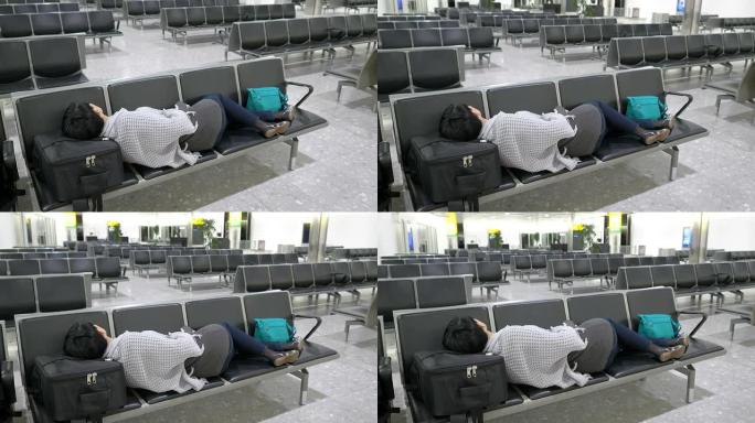 睡在机场的女人