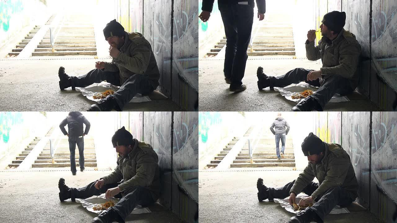 高清: 在一个无家可归的人旁边吃饭
