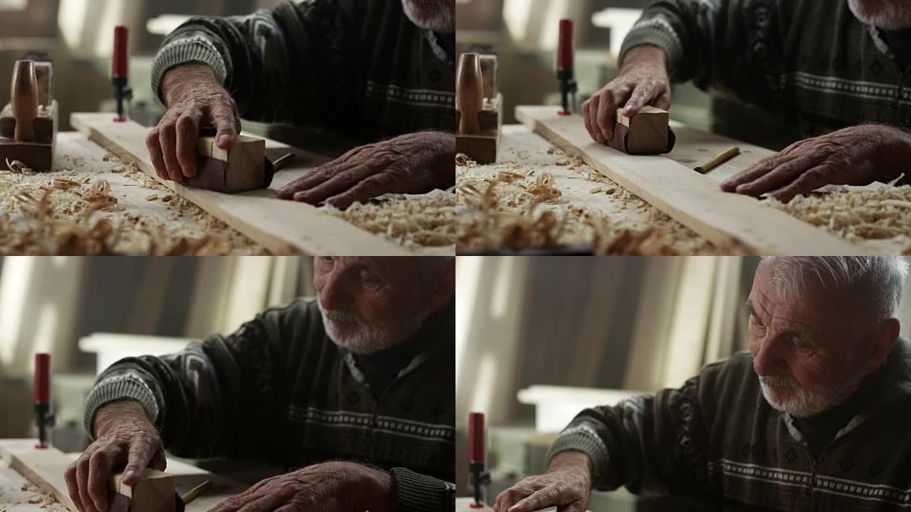 木匠用砂纸工作木匠用砂纸工作木工
