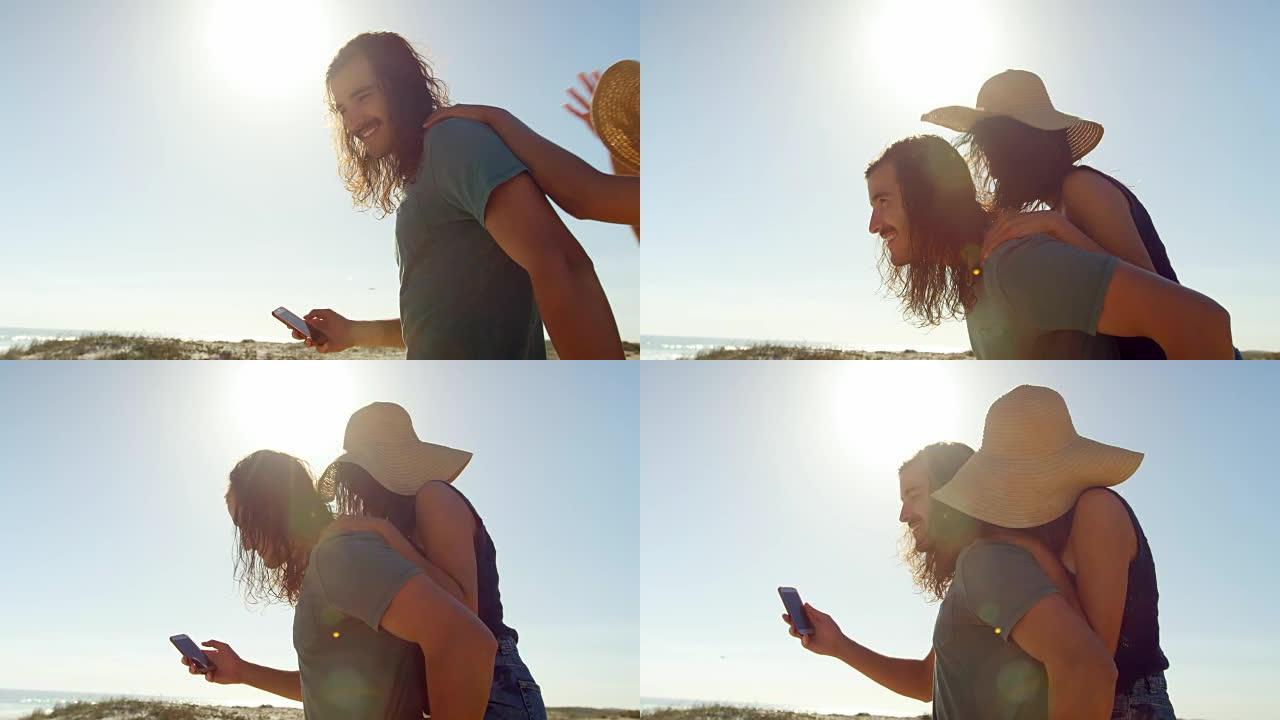 情侣在海滩上用手机自拍4k