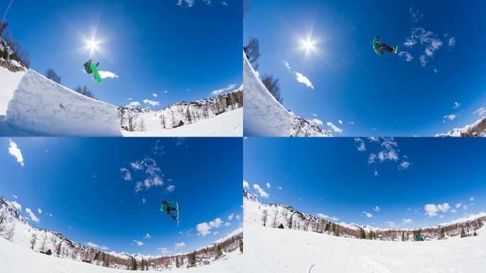 自由式滑雪者在雪地公园表演特技跳跃