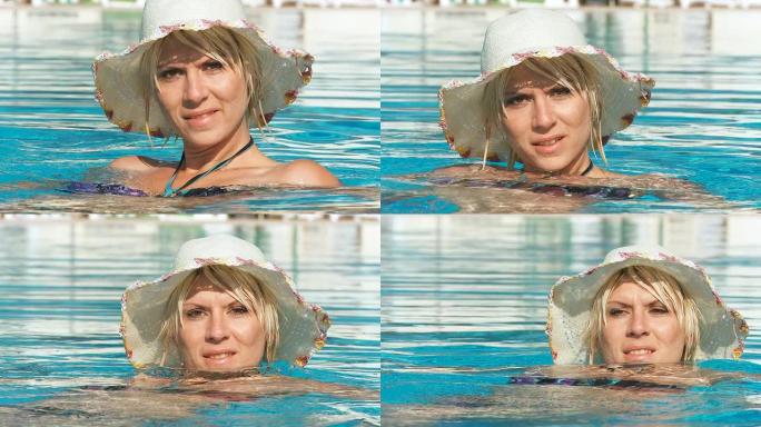 高清：女子在游泳池放松