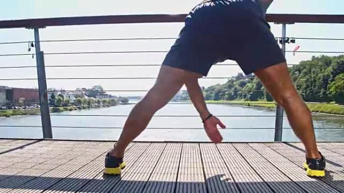 慢跑者在桥上热身桥上热身运动健身奋斗拼搏
