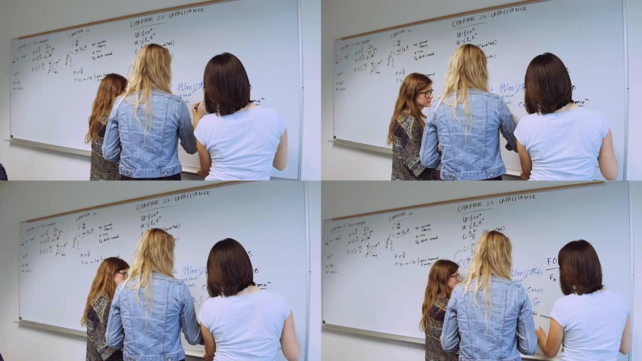 女大学生在白板上写字