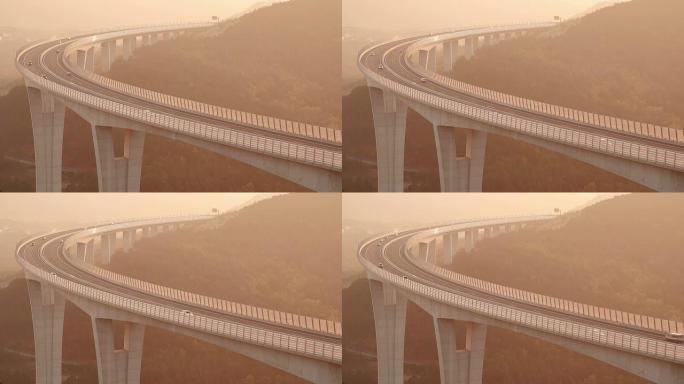 日落时分，车辆在高架桥上飞驰而过