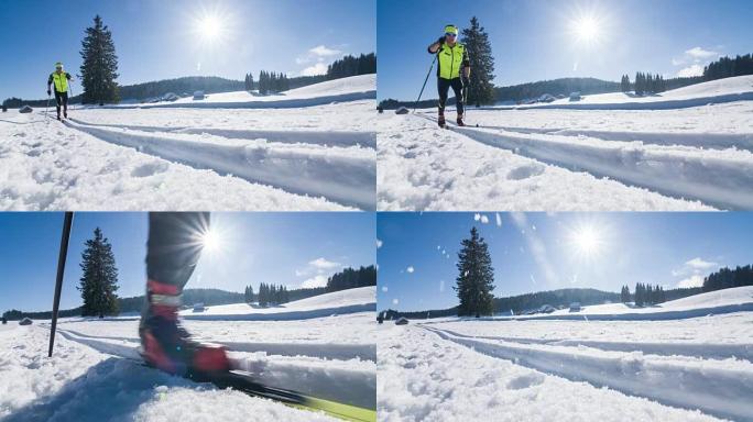 越野滑雪者在田园诗般的风景中的滑雪道上滑行