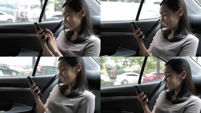在汽车上使用手机的女人