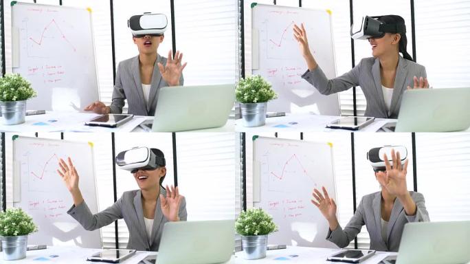 富有创造力的年轻开发人员在办公室的办公桌上使用虚拟现实眼镜