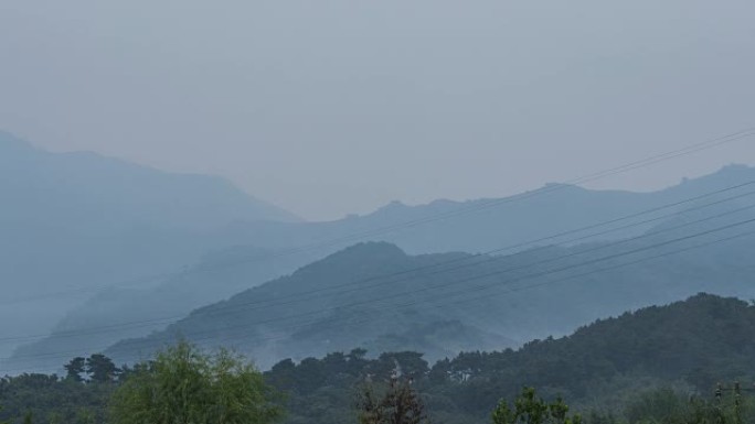 T/L MS HA雾升起在山林之上