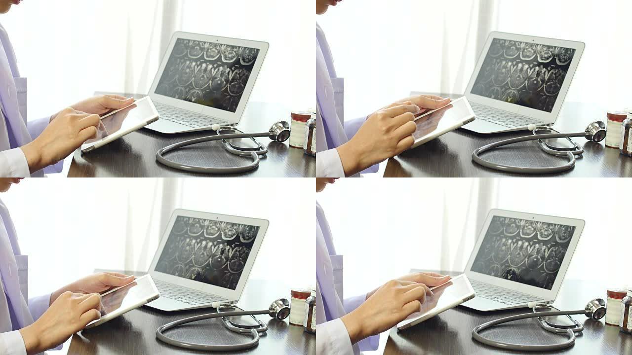 用笔记本电脑和药瓶在平板电脑上检查图像x射线MRI的女医生