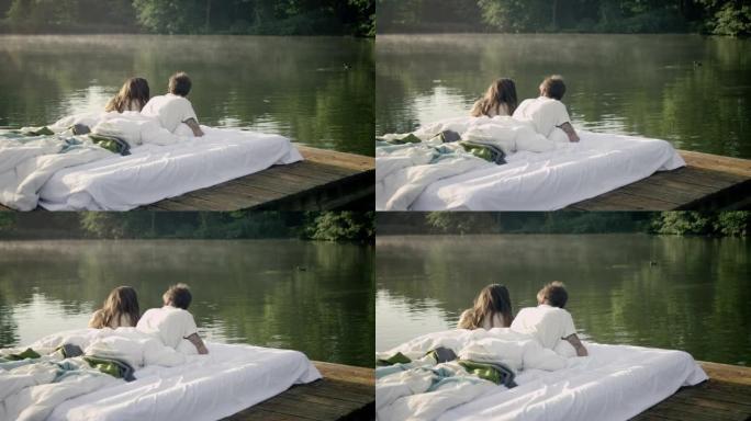 情侣在湖面上醒来谈恋爱水面湖水