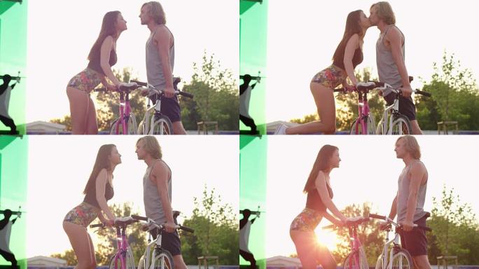 情侣骑自行车接吻约会亲吻