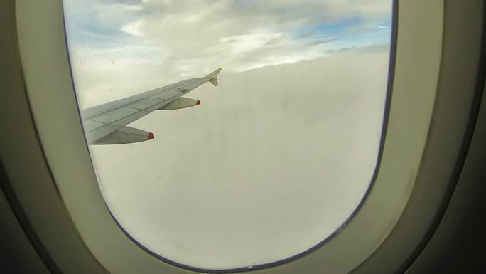 T/L飞越云层云海高空机翼机舱窗外