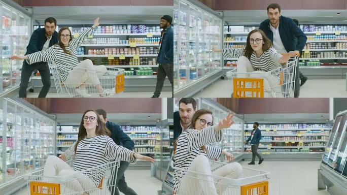 在超市: 男人推着购物车，女人坐在购物车中，幸福的夫妇很有趣地在手推车上通过商店进行赛车漂移。
