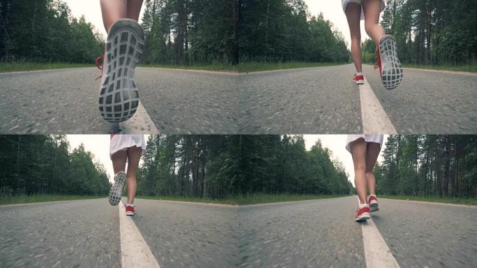 穿着运动鞋的女性脚开始慢动作。健康苗条的年轻女运动员跑步。