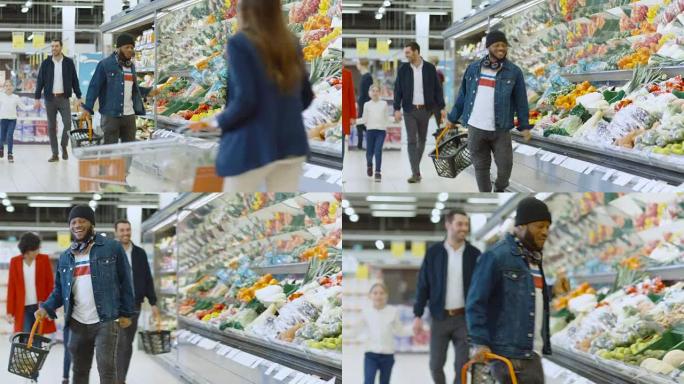 在超市: 时尚的非洲裔美国人在商店的新鲜农产品区跳舞。购物愉快，而其他顾客微笑。