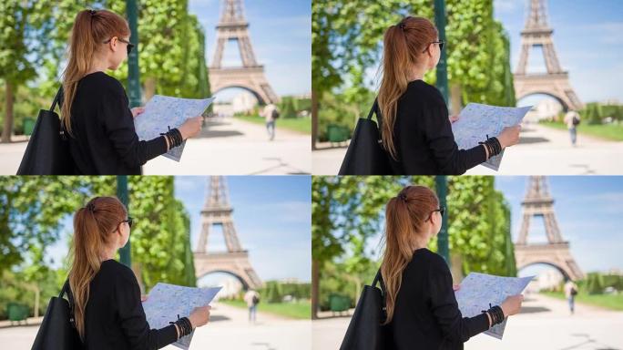 女人跟随巴黎旅游景点地图，仰望埃菲尔铁塔