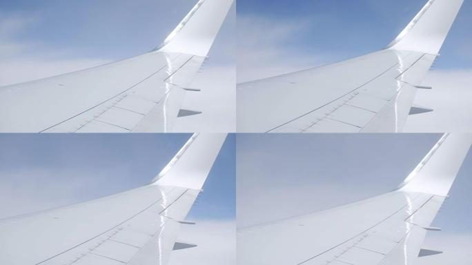 飞行过程中飞机窗口的云层视图