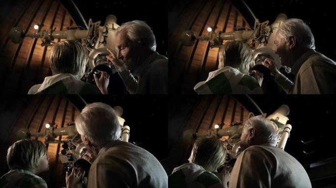 祖父和孙子在天文台