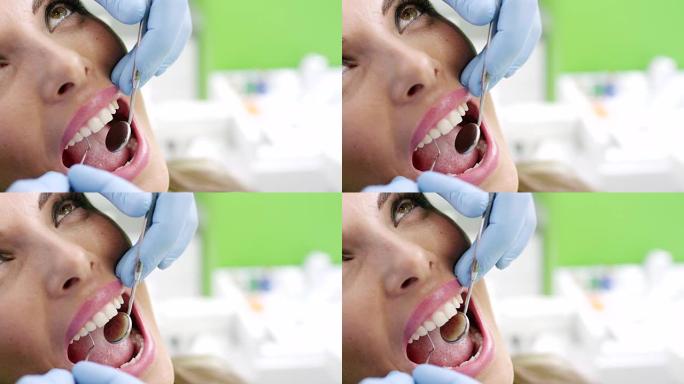 牙医的年轻女子洁白大牙整齐门牙飘落大牙