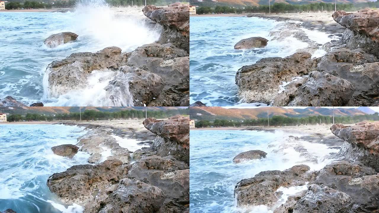克里特。希腊大海边浪花海岛拍打石头礁石